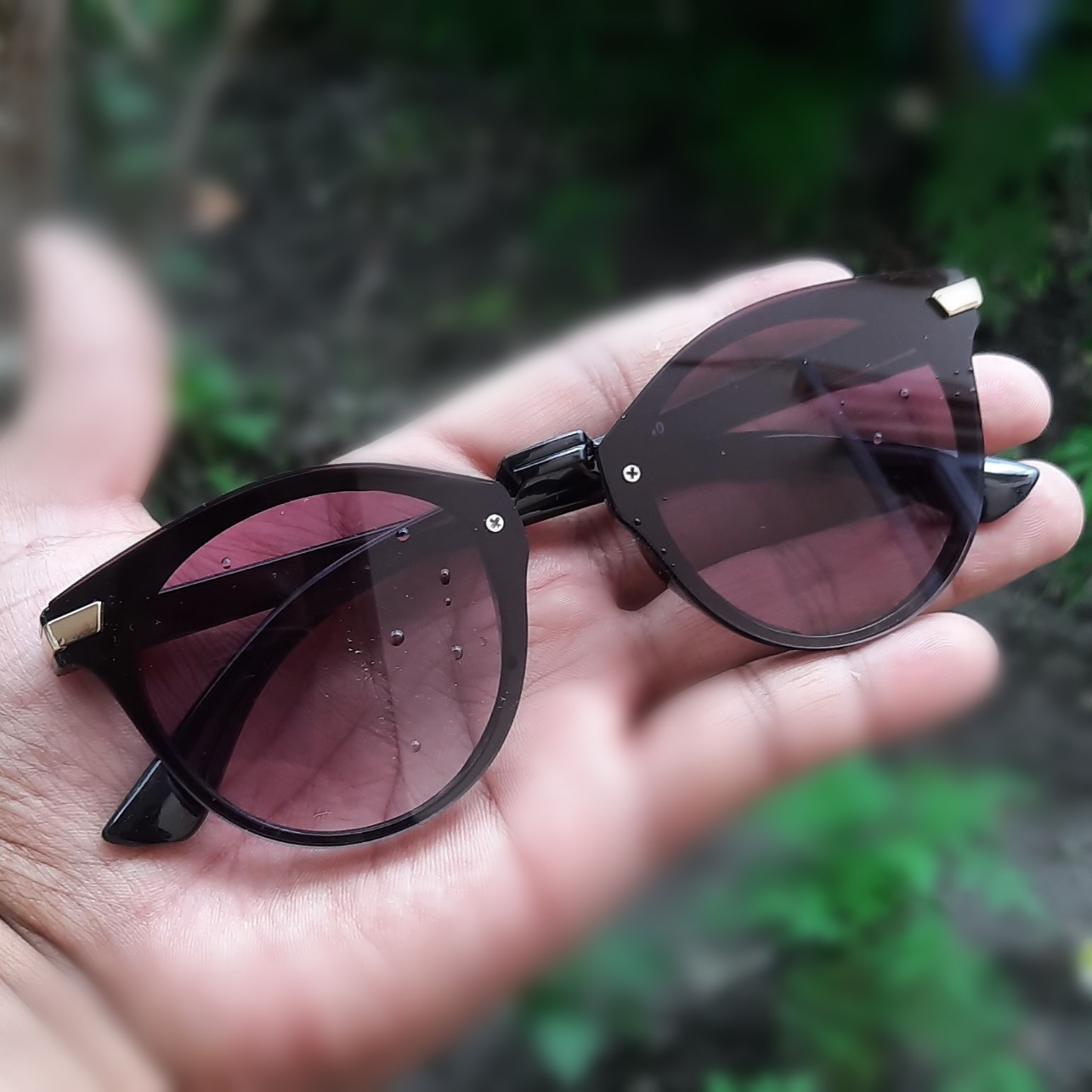 black rimless cat eye sunglasses