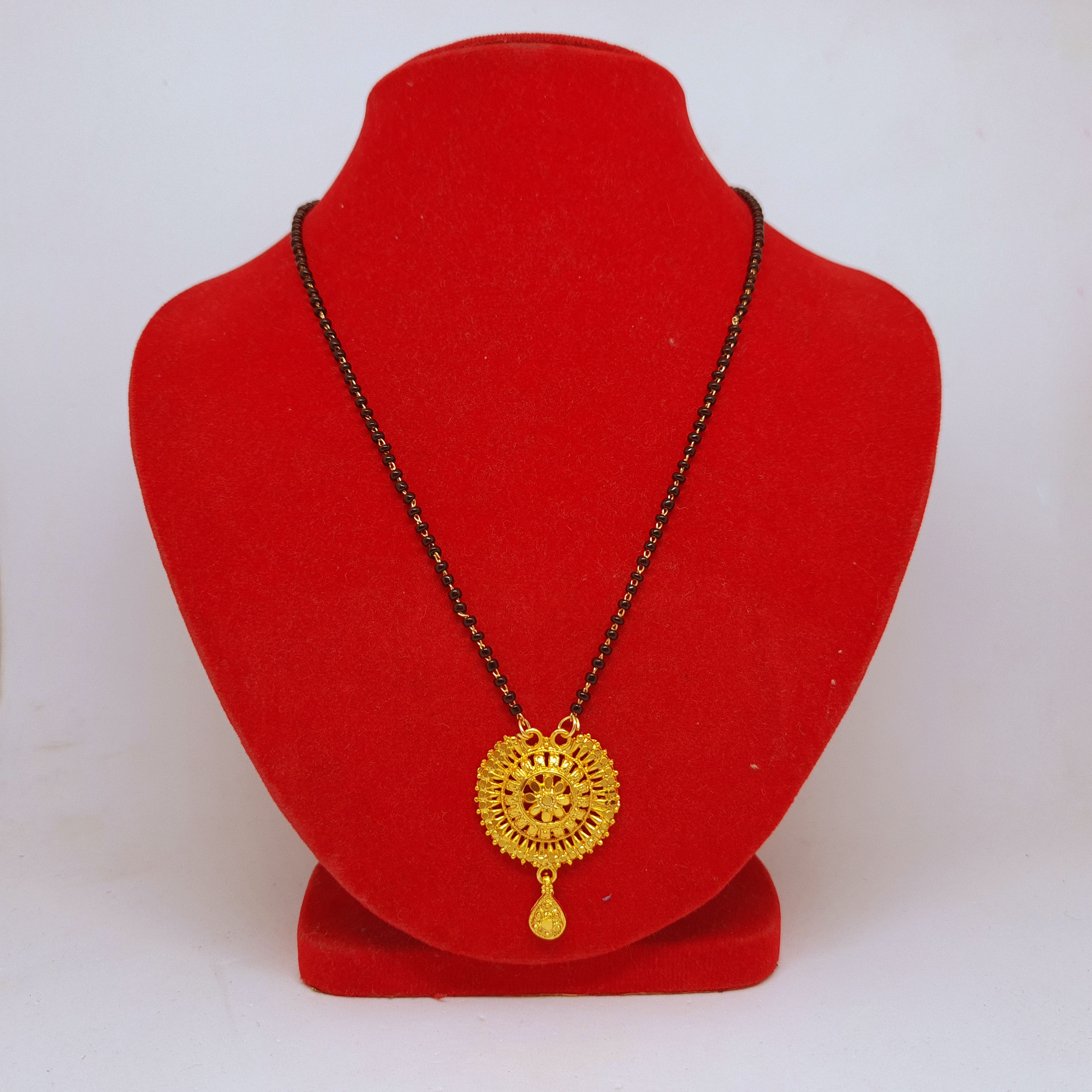 Gold mangalsutra big hot sale pendant designs